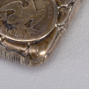 Coins on Simulated Alligator Skin Matchsafe, 1888