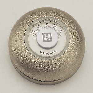Thermostat, Honeywell CT87K Round Heat-Only Manual Thermostat, current production model based on design introduced in 1953