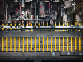 Photograph, A tipping machine adding metal ferrules and erasers to pencils