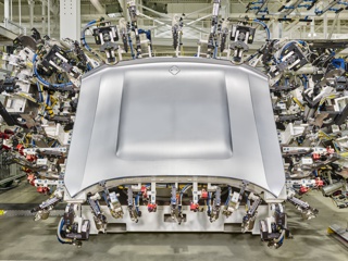 Photograph, Welding robots manufacturing the body of a Hyundai IONIQ5