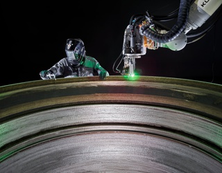 Photograph, Stargate, a 3D metal printer, prints a Terran 1 rocket