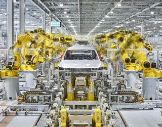 Photograph, Welding robots manufacturing the body of a Hyundai IONIQ5