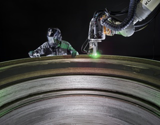 Photograph, Stargate, a 3D metal printer, prints a Terran 1 rocket