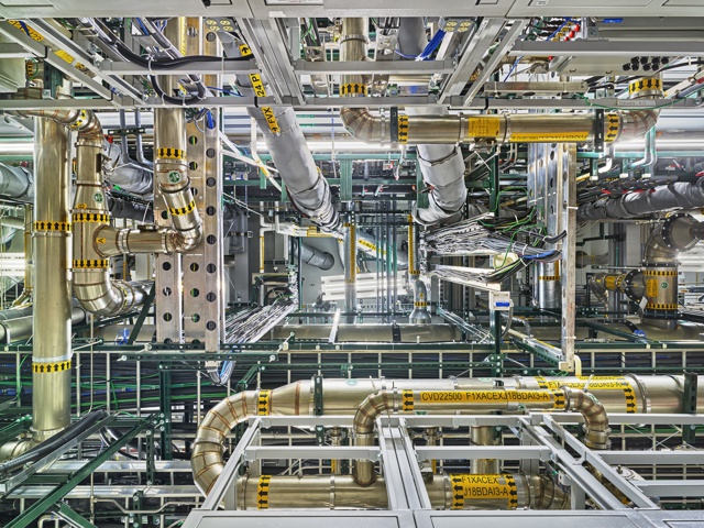 Photograph, View looking up at the subfab of a semiconductor fabrication facility