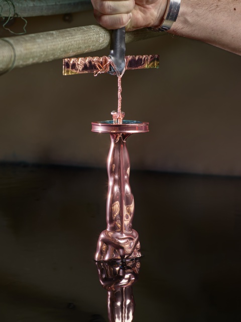 Photograph, Triple-plating Oscar® statuette in copper, nickel, and gold, 2022