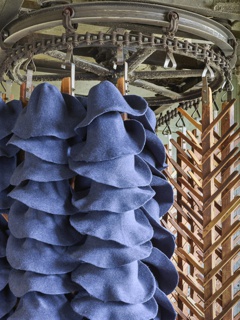Photograph, Felted hat bodies entering the dryer after dyeing