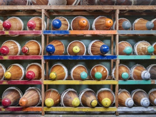 Photograph, Handmade wooden former cones used to form a variety hat shapes and sizes